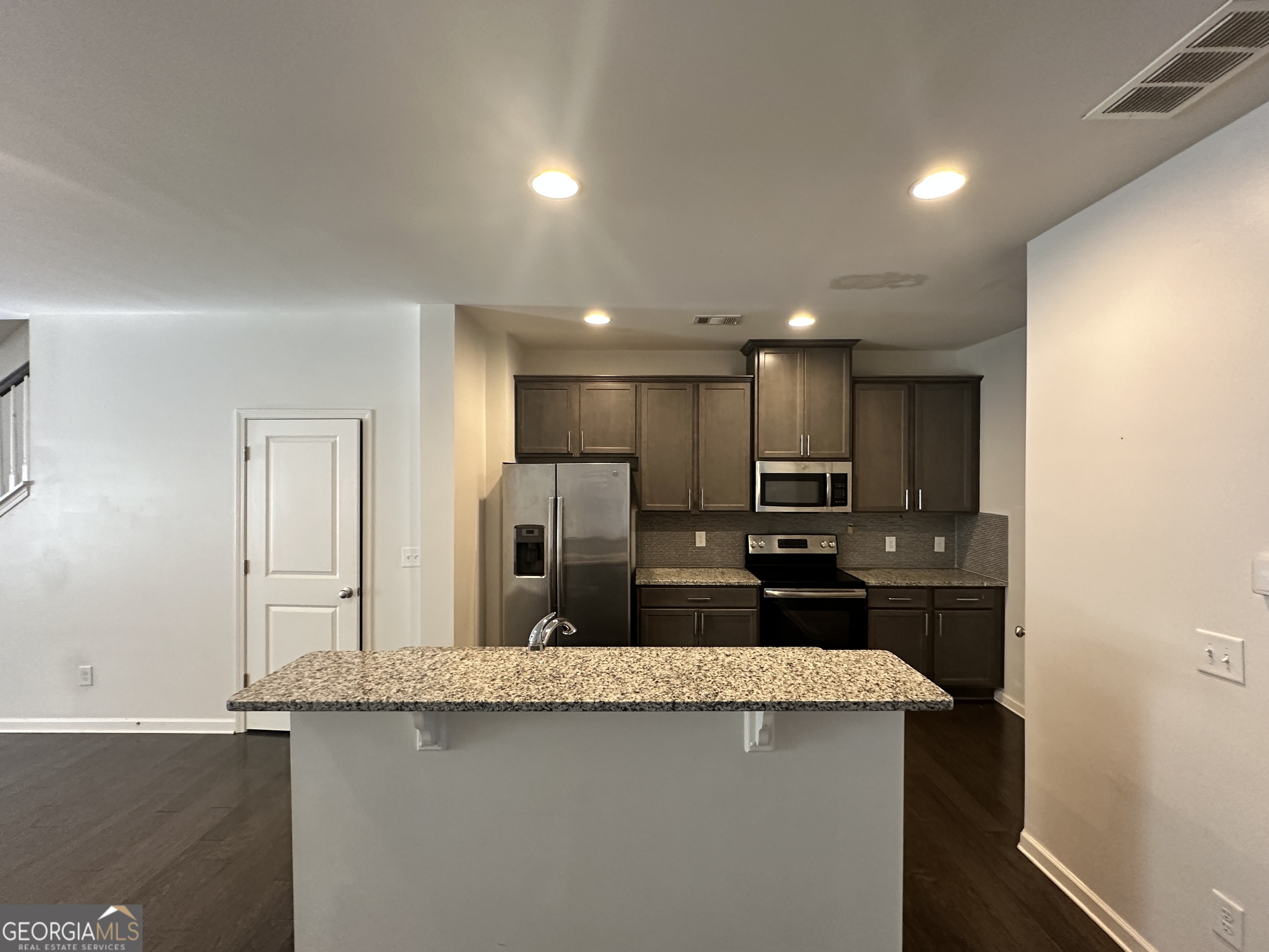 882 Ambient Way Atlanta, GA 30331 - Photo 57 of 61 a view of a kitchen with a sink and refrigerator