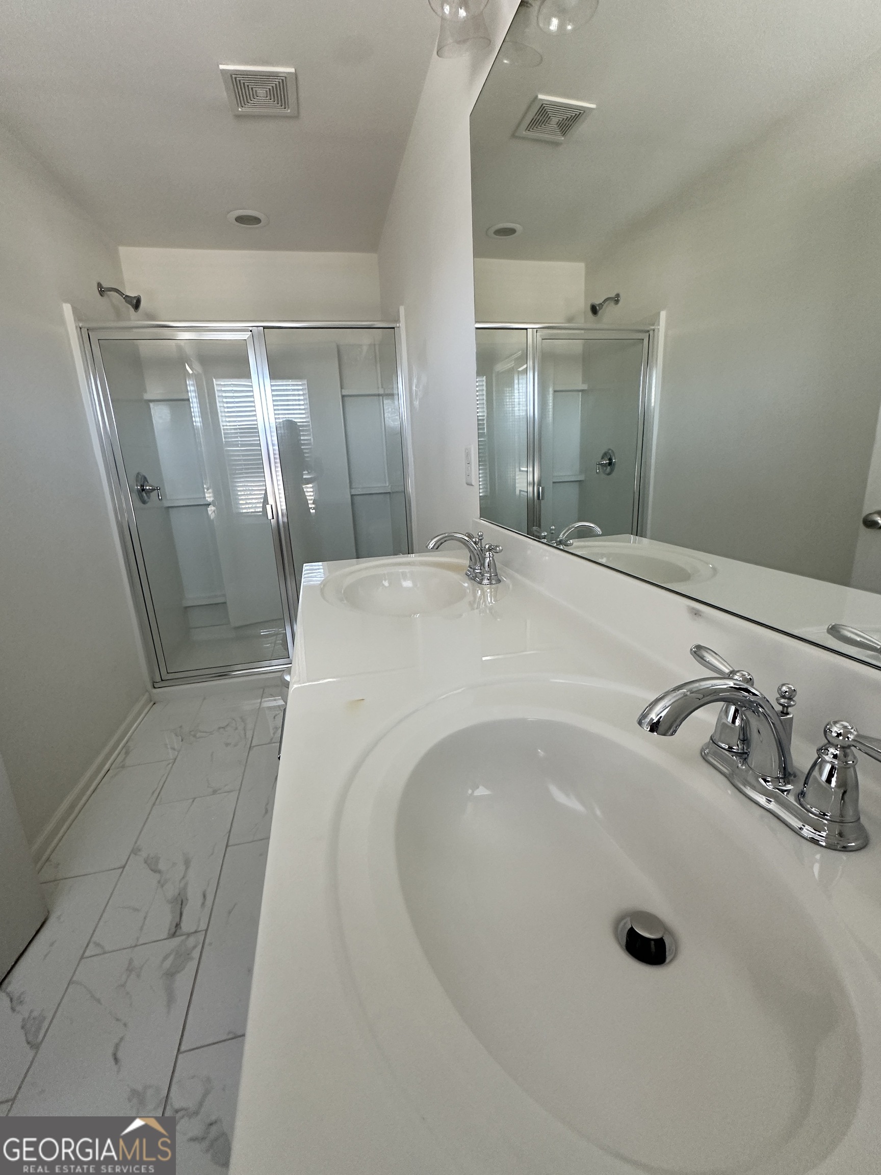 882 Ambient Way Atlanta, GA 30331 - Photo 7 of 61 a bathroom with a tub sink vanity and shower