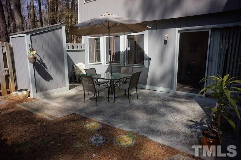 608 Dylan Court Raleigh, NC 27606 - Photo 10 of 12 Relax and BBQ in the excellent outdoor space! This oversized enclosed patio area features a privacy fence, storage room and a large garden space!