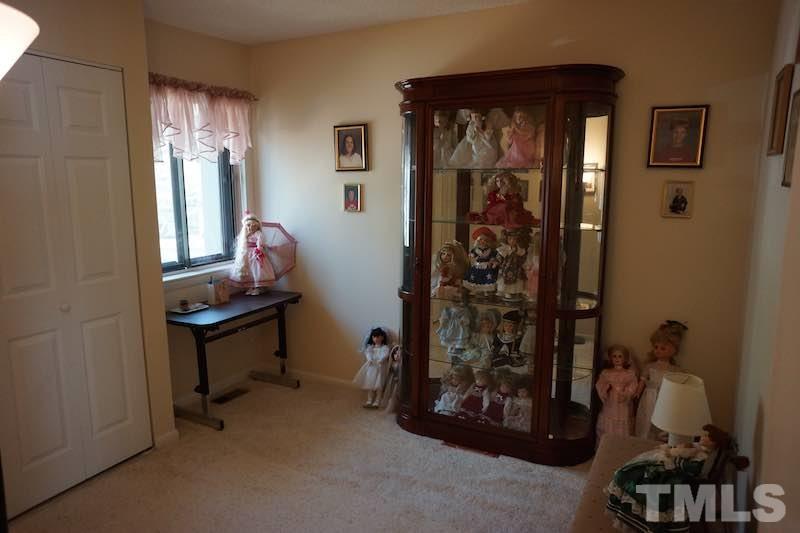 608 Dylan Court Raleigh, NC 27606 - Photo 6 of 12 The THIRD bedroom is current used as a doll display room.
