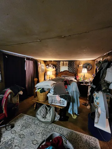 a room with lots of storage and a television