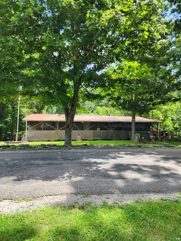 a view of a yard with an outdoor space