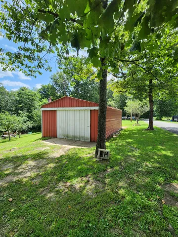 a view of an outdoor space and a yard