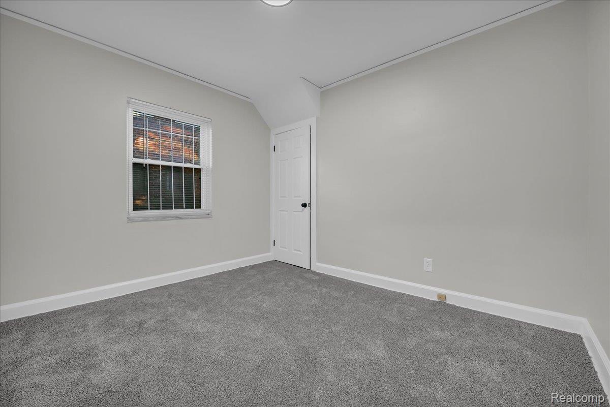 16717 Fielding Street Detroit, MI 48219 - Photo 25 of 46 Carpeted spare room featuring baseboards