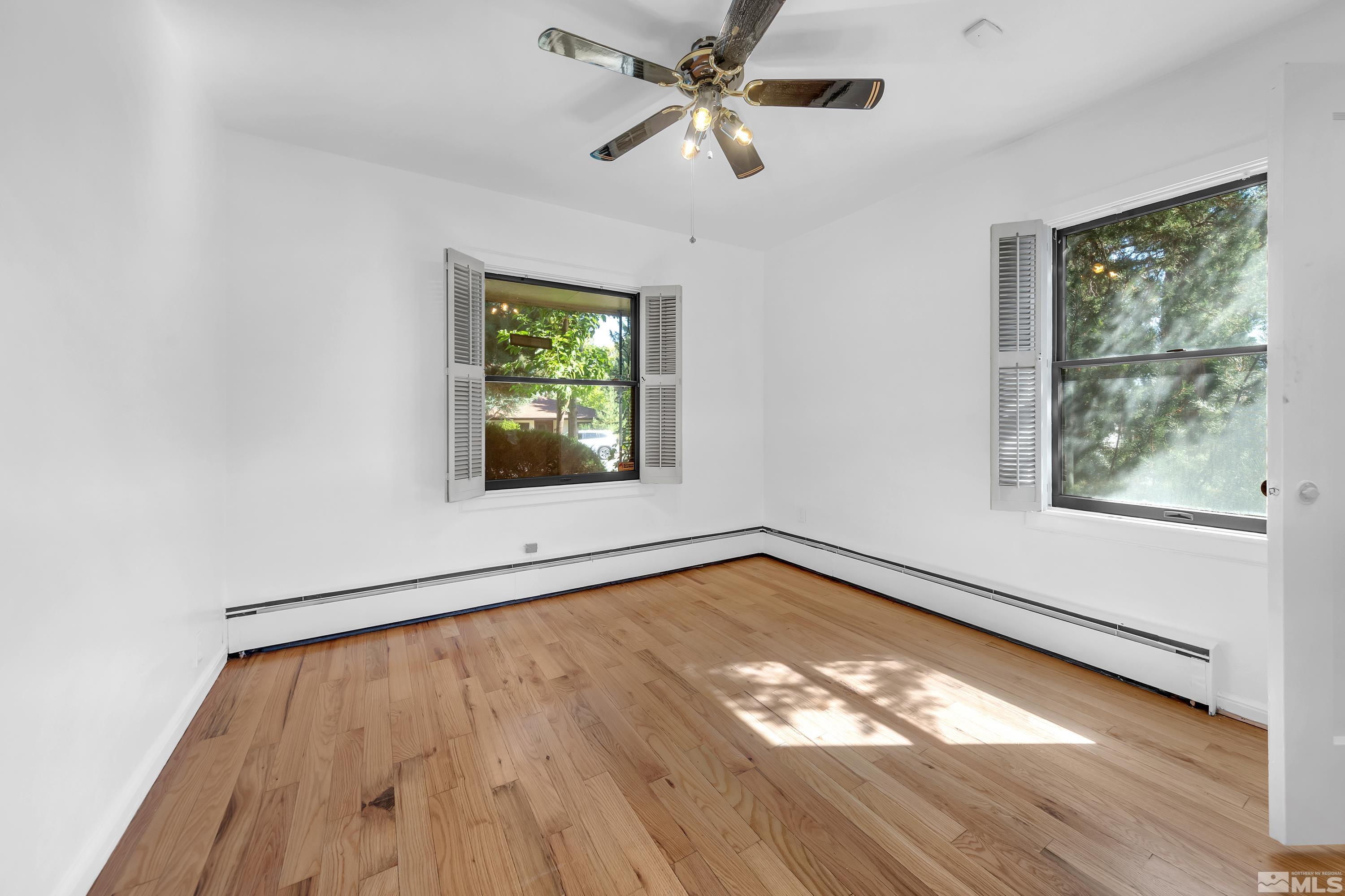 2199 Humboldt Street Reno, NV 89509 - Photo 21 of 35 wooden floor in an empty room with a window