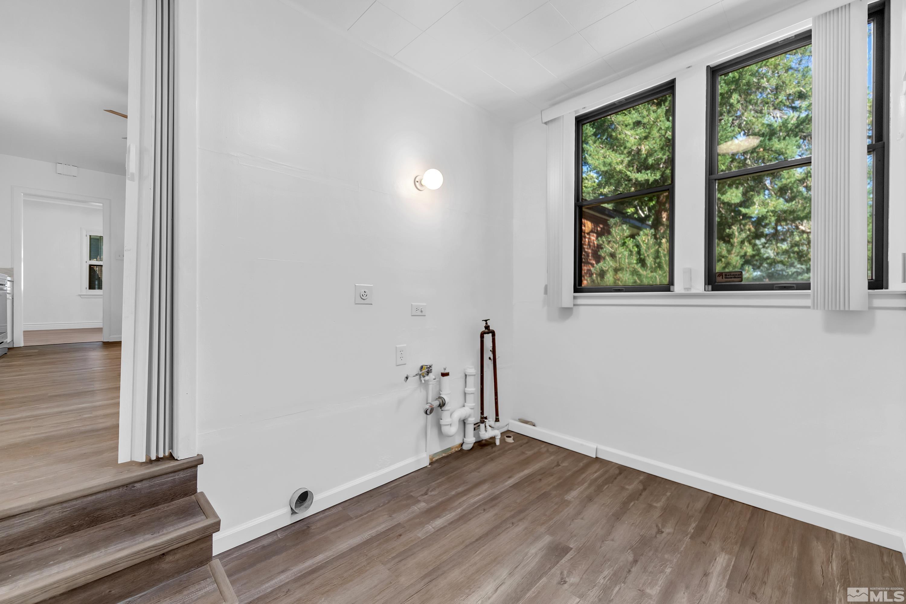 2199 Humboldt Street Reno, NV 89509 - Photo 28 of 35 an empty room with wooden floor and windows