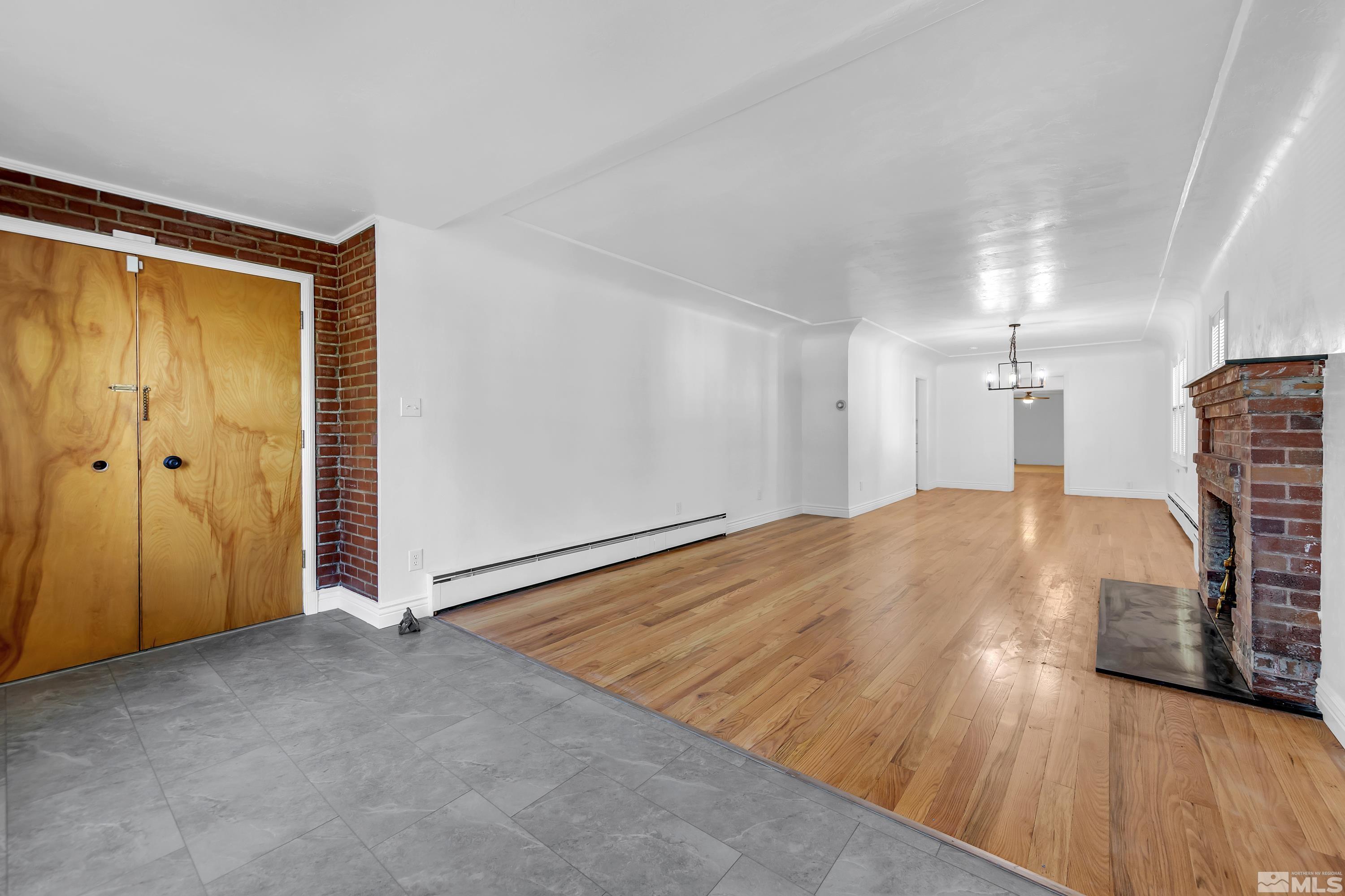 2199 Humboldt Street Reno, NV 89509 - Photo 3 of 35 a view of empty room with wooden floor