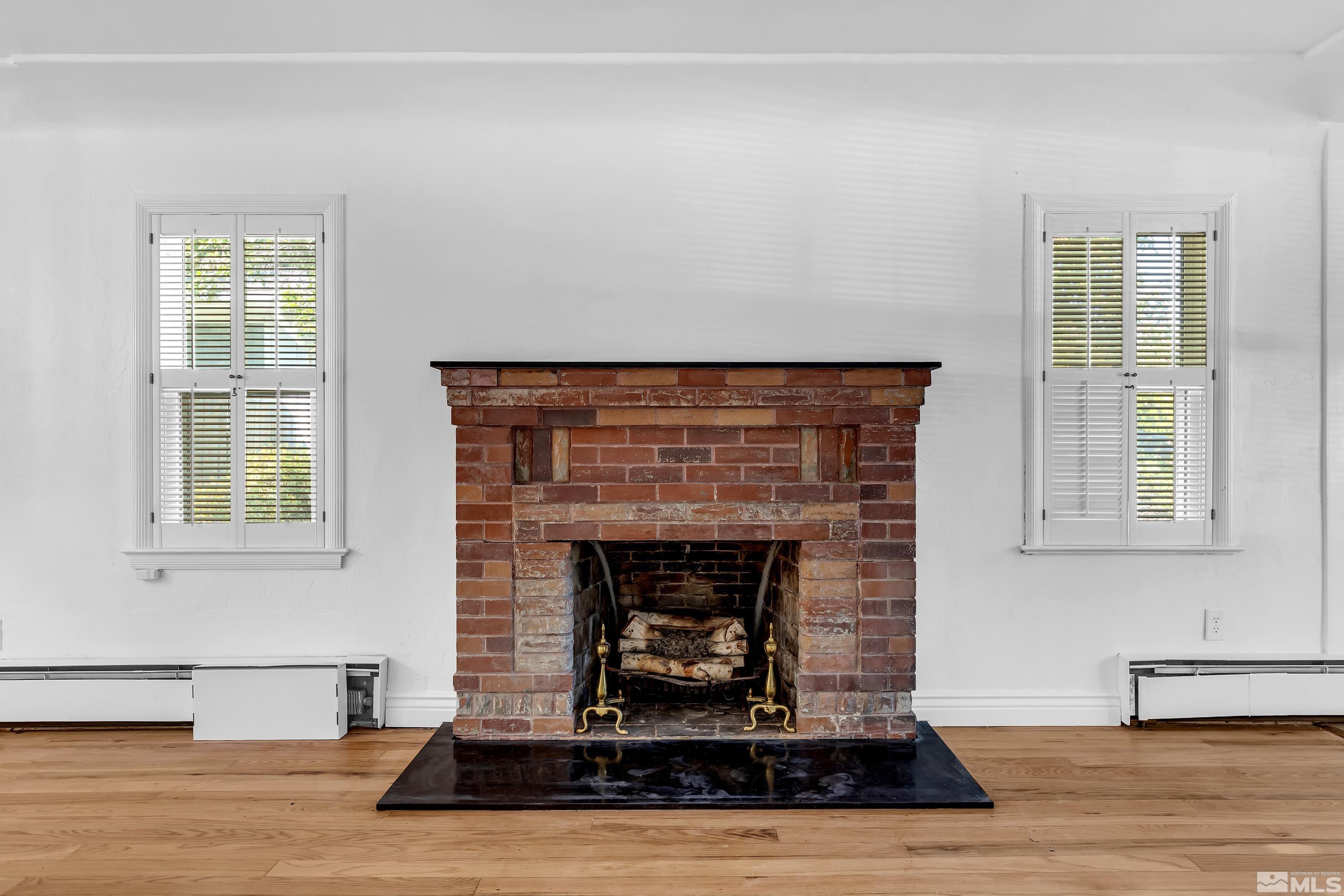 2199 Humboldt Street Reno, NV 89509 - Photo 5 of 35 a living room with furniture and a fireplace
