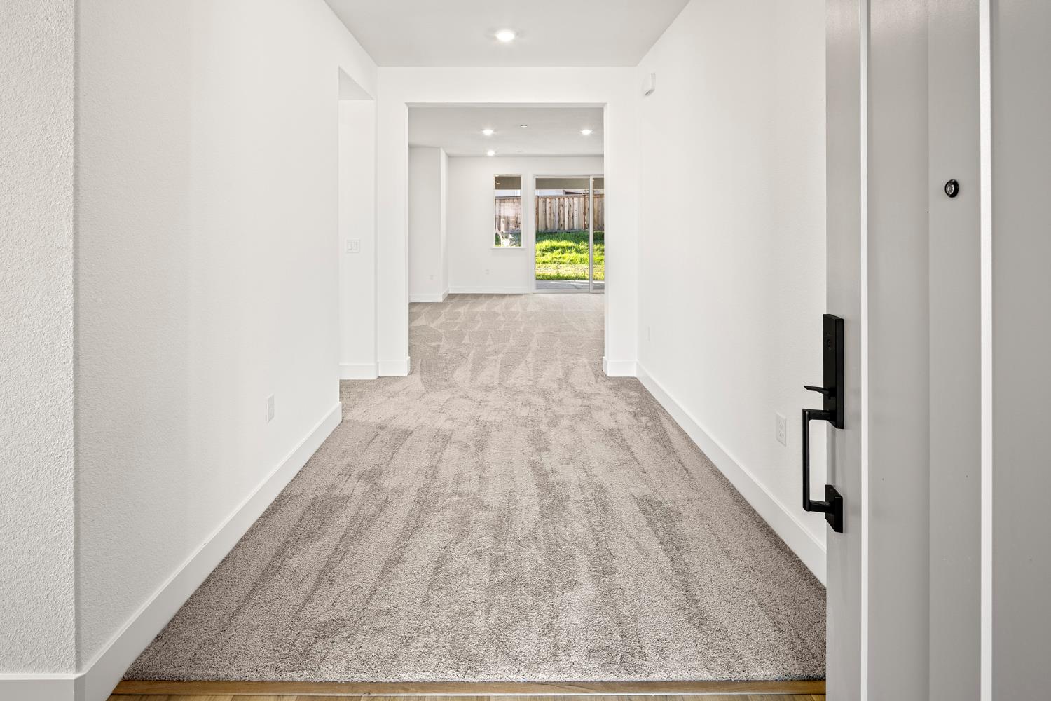 2425 Briar Meadow Circle Auburn, CA 95603 - Photo 12 of 51 a view of a hallway with wooden floor and staircase