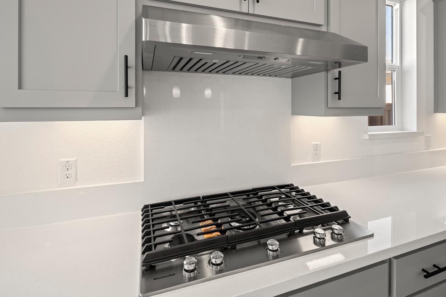 2425 Briar Meadow Circle Auburn, CA 95603 - Photo 19 of 51 a kitchen with a stove and a white cabinet