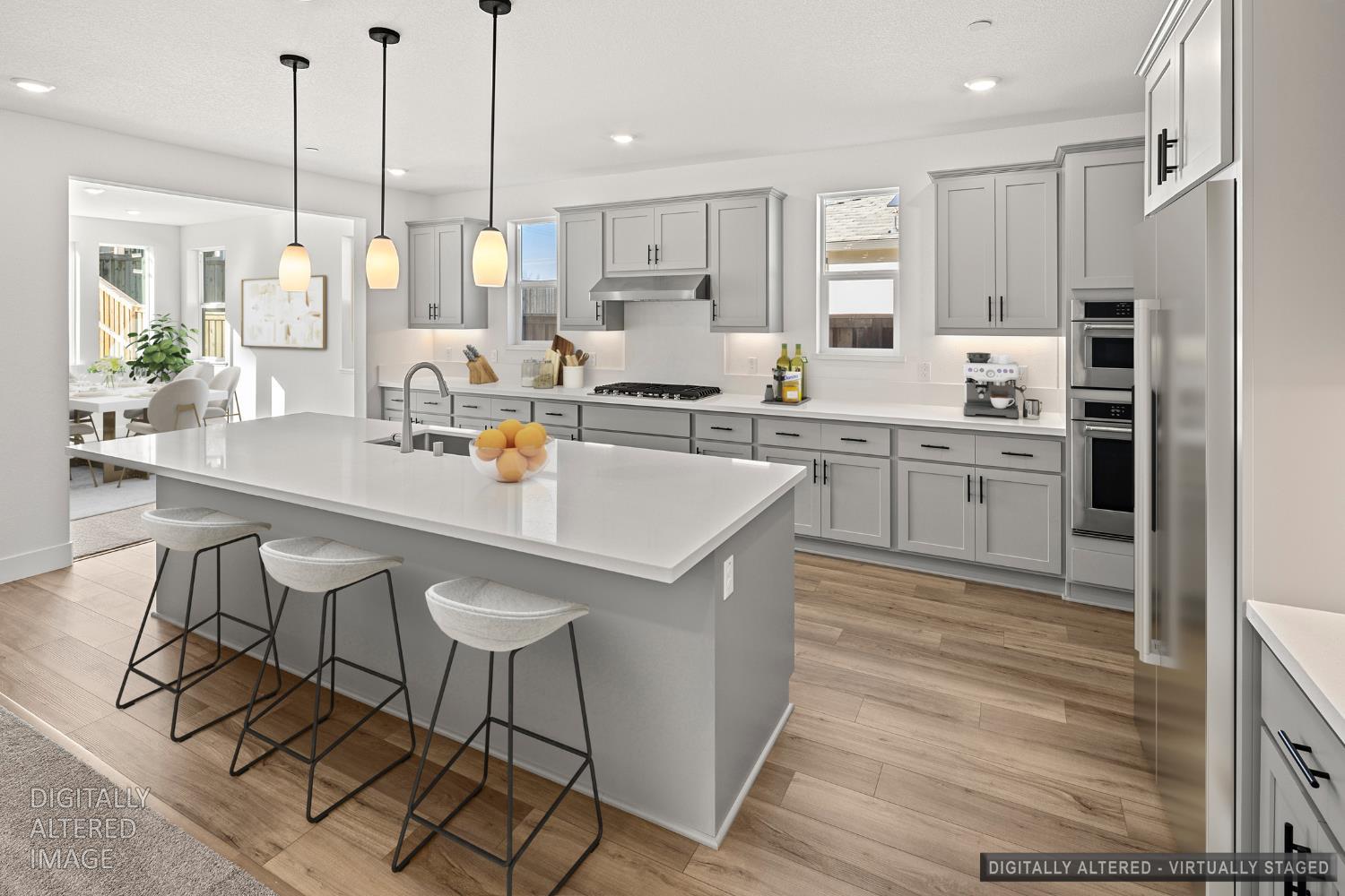 2425 Briar Meadow Circle Auburn, CA 95603 - Photo 3 of 51 a kitchen with stainless steel appliances granite countertop a sink a stove a refrigerator and cabinets