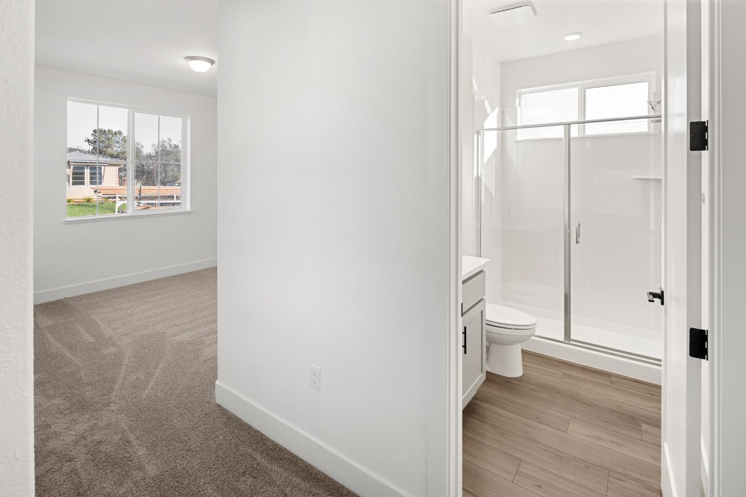 2425 Briar Meadow Circle Auburn, CA 95603 - Photo 37 of 51 a bathroom with a toilet and a shower