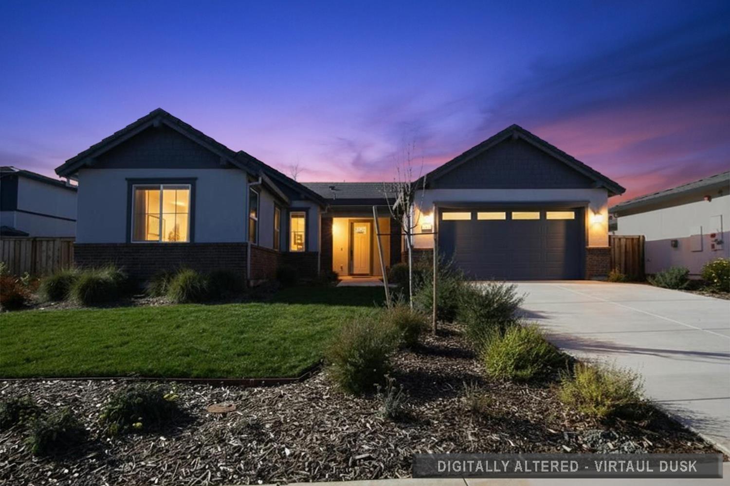 2425 Briar Meadow Circle Auburn, CA 95603 - Photo 49 of 51 a front view of a house with a yard and garage