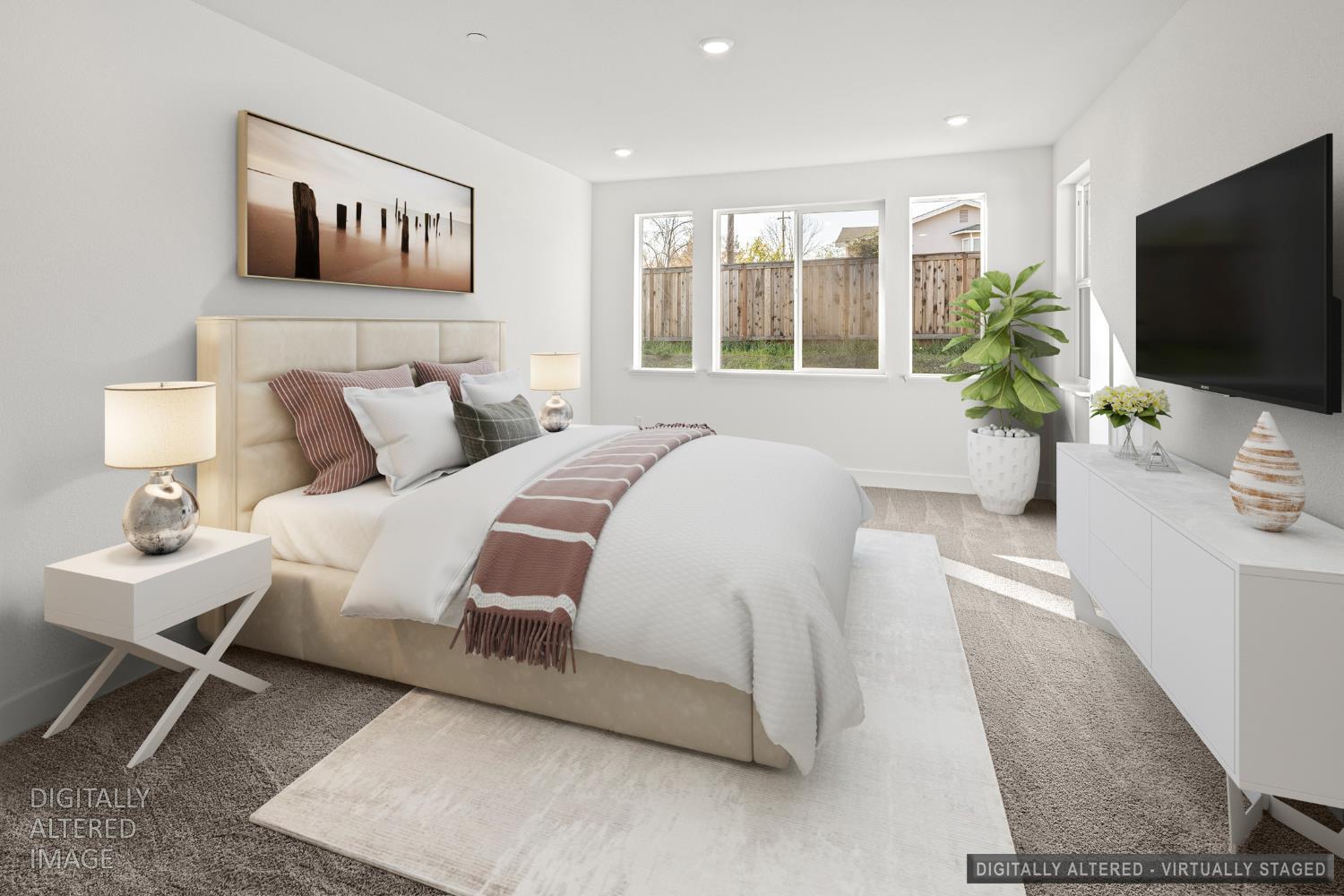 2425 Briar Meadow Circle Auburn, CA 95603 - Photo 5 of 51 a bedroom with a bed and a flat screen tv