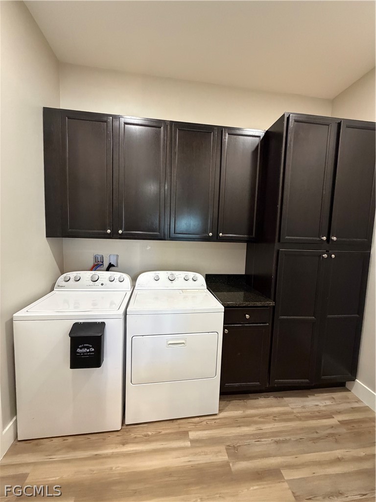 11595 Tomato Road Naples, FL 34114 - Photo 6 of 15 a utility room with dryer and washer