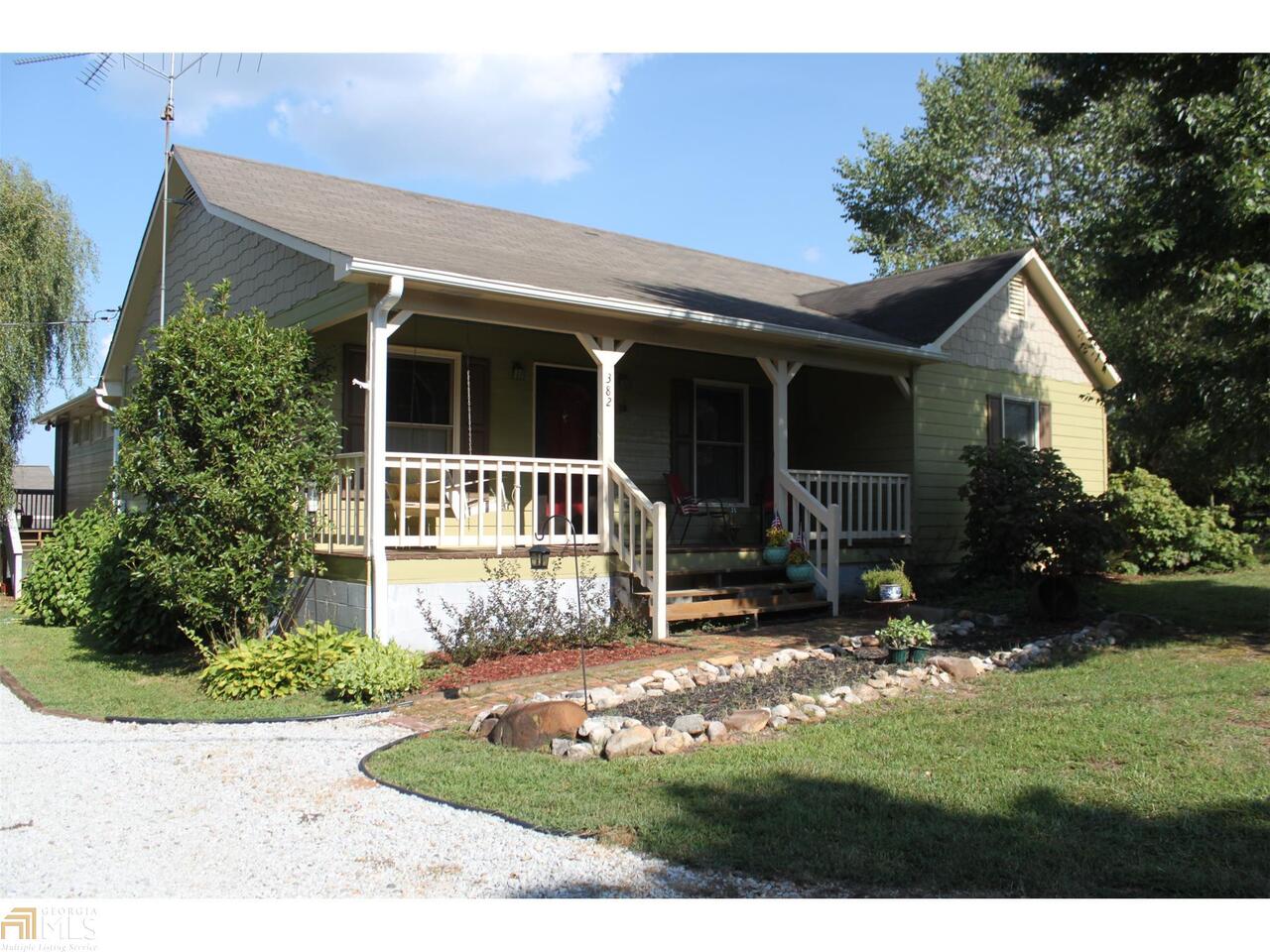 a view front of house with a yard