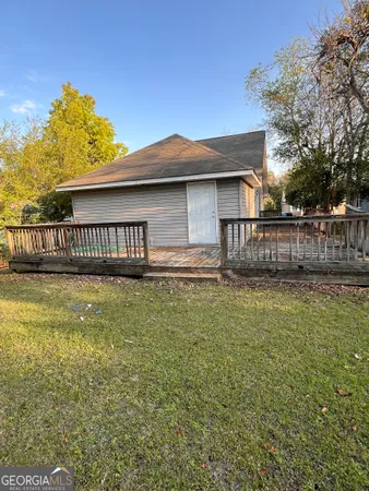 a view of a backyard with a garden