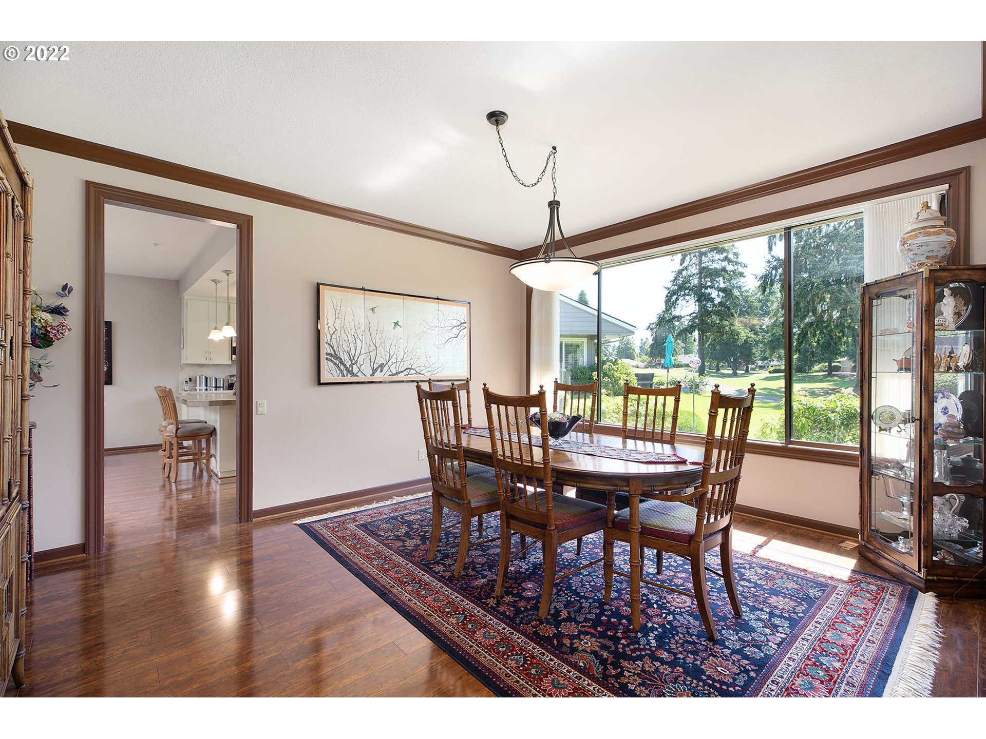 32221 Southwest Boones Bend Road Wilsonville, OR 97070 - Photo 13 of 32 a view of a dining room with furniture window and wooden floor