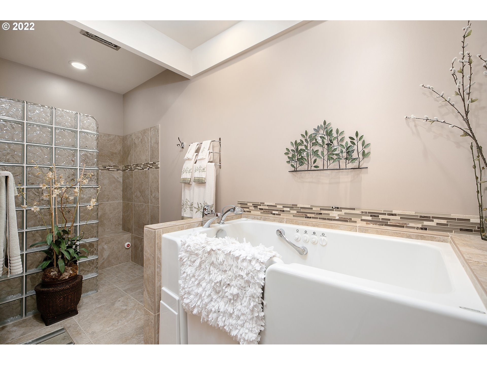 32221 Southwest Boones Bend Road Wilsonville, OR 97070 - Photo 24 of 32 a bathroom with a tub a sink and a shower