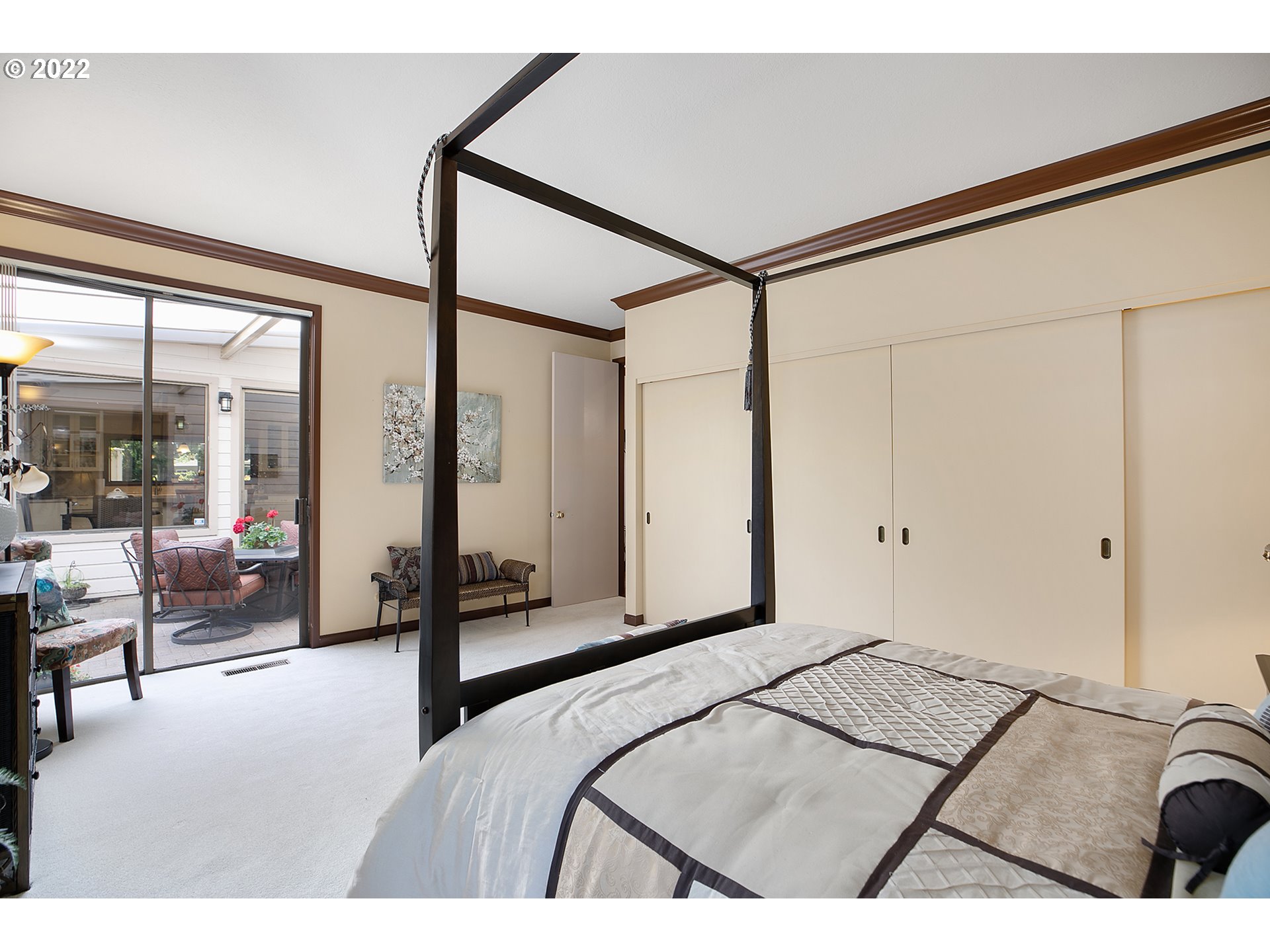 32221 Southwest Boones Bend Road Wilsonville, OR 97070 - Photo 27 of 32 a bedroom with a bed and a large window