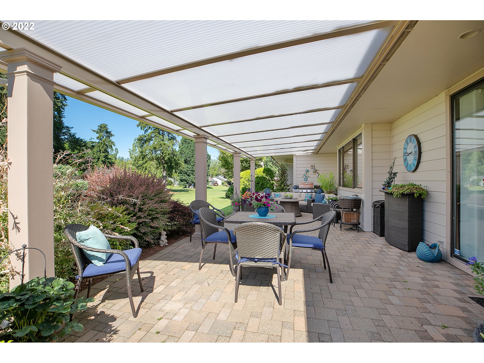 32221 Southwest Boones Bend Road Wilsonville, OR 97070 - Photo 8 of 32 a patio with patio furniture and potted plants