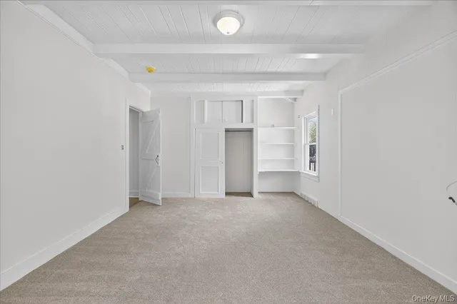 a bathroom with a double vanity sink mirror and shower