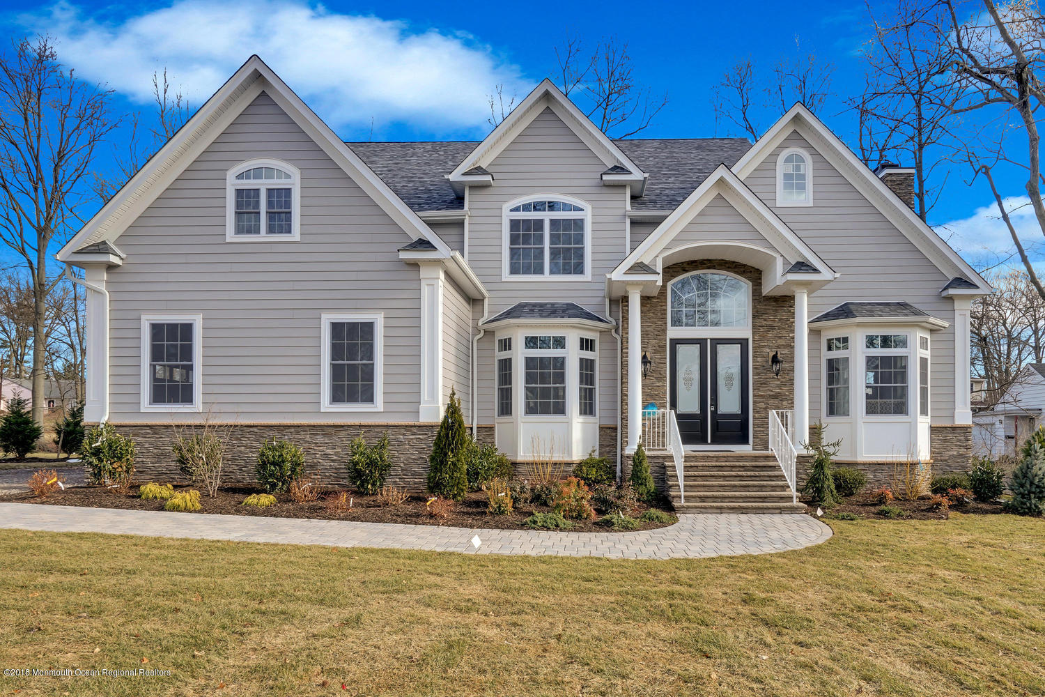 77 Stafford Road Colonia, NJ 07067 - Photo 1 of 17 a front view of a house with a yard