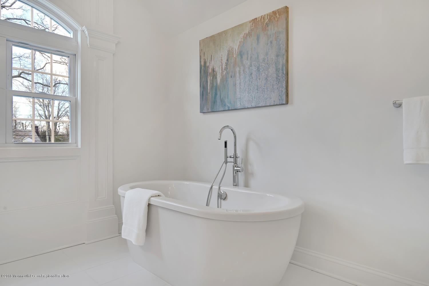 77 Stafford Road Colonia, NJ 07067 - Photo 16 of 17 a bathroom with a sink and a window