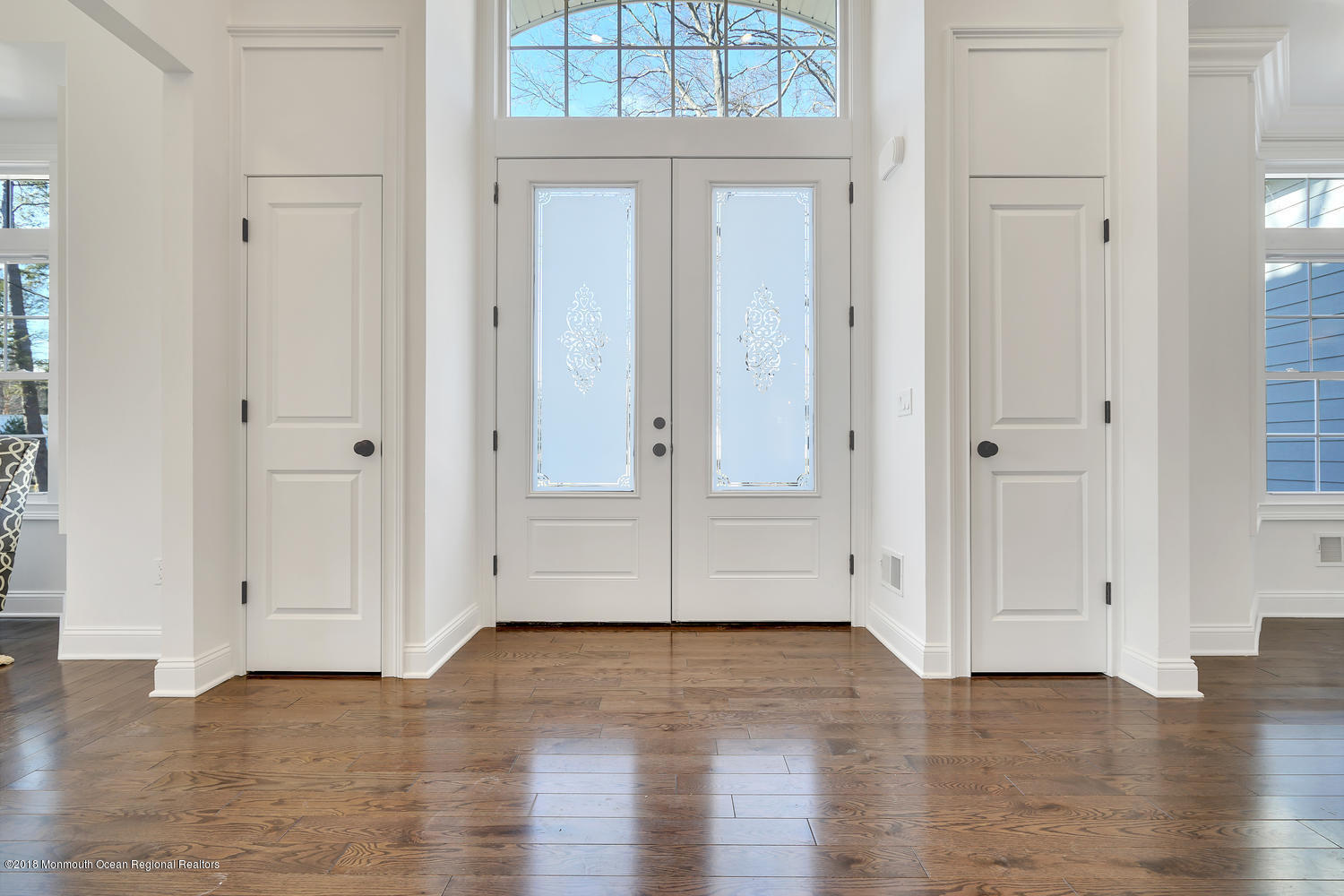 77 Stafford Road Colonia, NJ 07067 - Photo 2 of 17 an empty room with wooden floor and windows