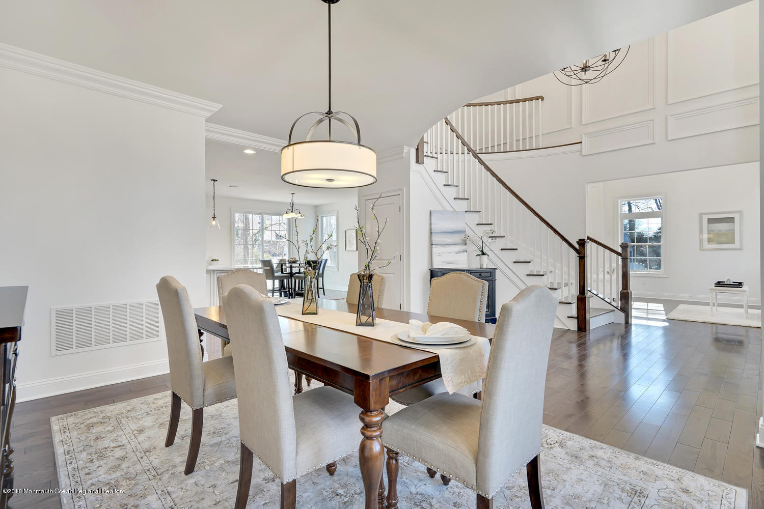 77 Stafford Road Colonia, NJ 07067 - Photo 6 of 17 a view of a dining room with furniture wooden floor and chandelier