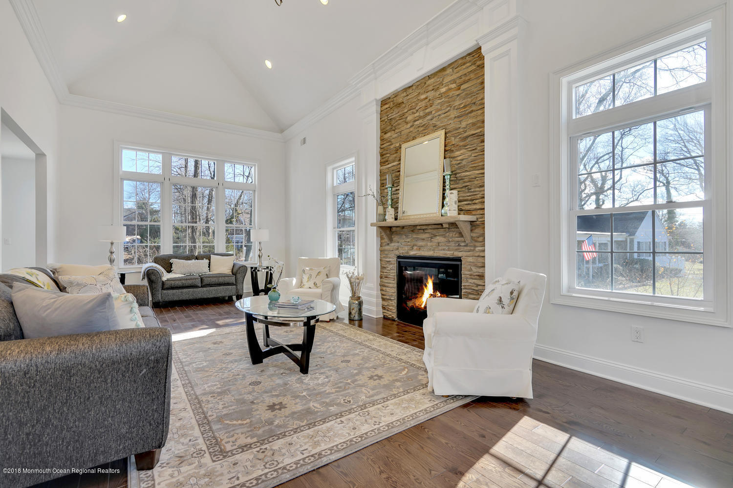 77 Stafford Road Colonia, NJ 07067 - Photo 7 of 17 a living room with furniture and a fireplace