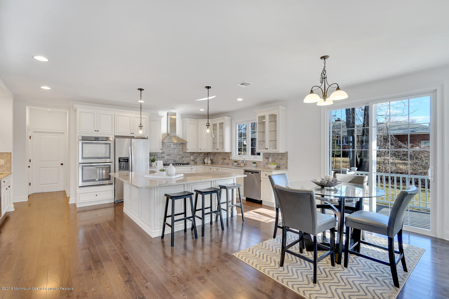 77 Stafford Road Colonia, NJ 07067 - Photo 9 of 17 a view of a dining room with furniture and wooden floor