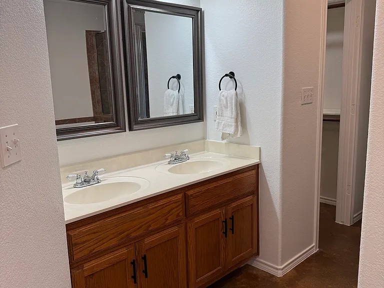 430 Summit Ridge Drive North Point Venture, TX 78645 - Photo 11 of 26 Double vanity with ample counter space, perfect for shared morning routines.