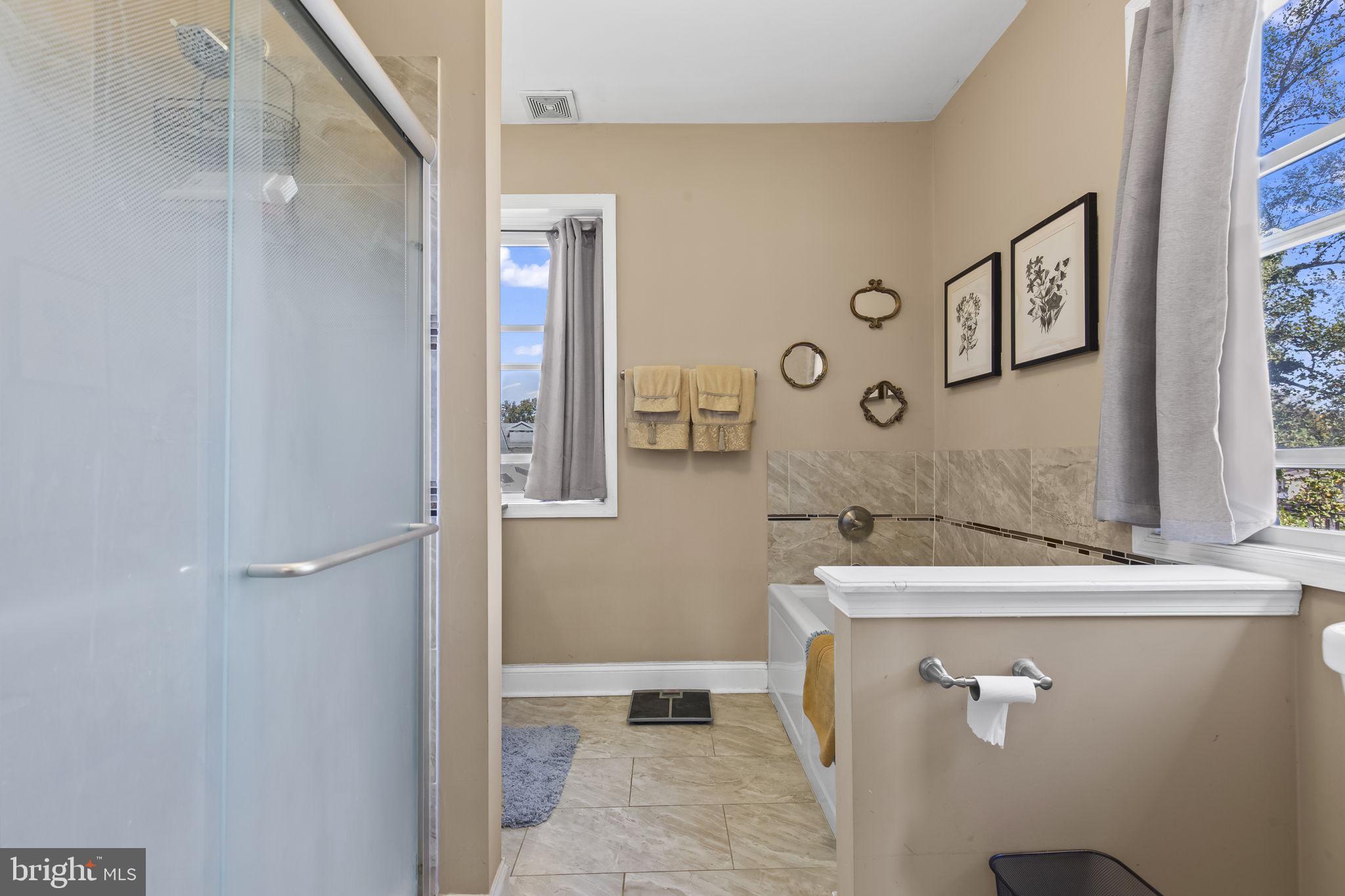 2600 Queen Anne Road Baltimore, MD 21216 - Photo 12 of 29 a bathroom with a sink and a mirror