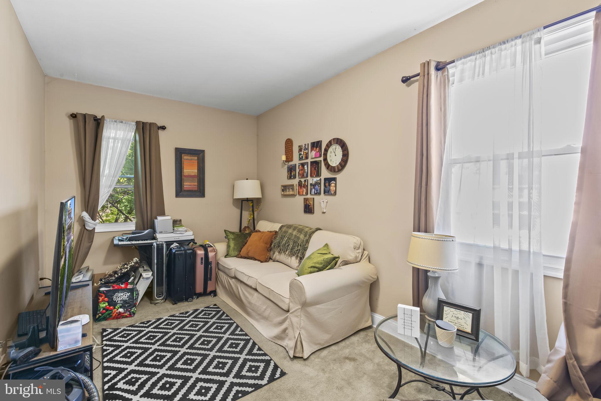 2600 Queen Anne Road Baltimore, MD 21216 - Photo 14 of 29 a living room with furniture and a window