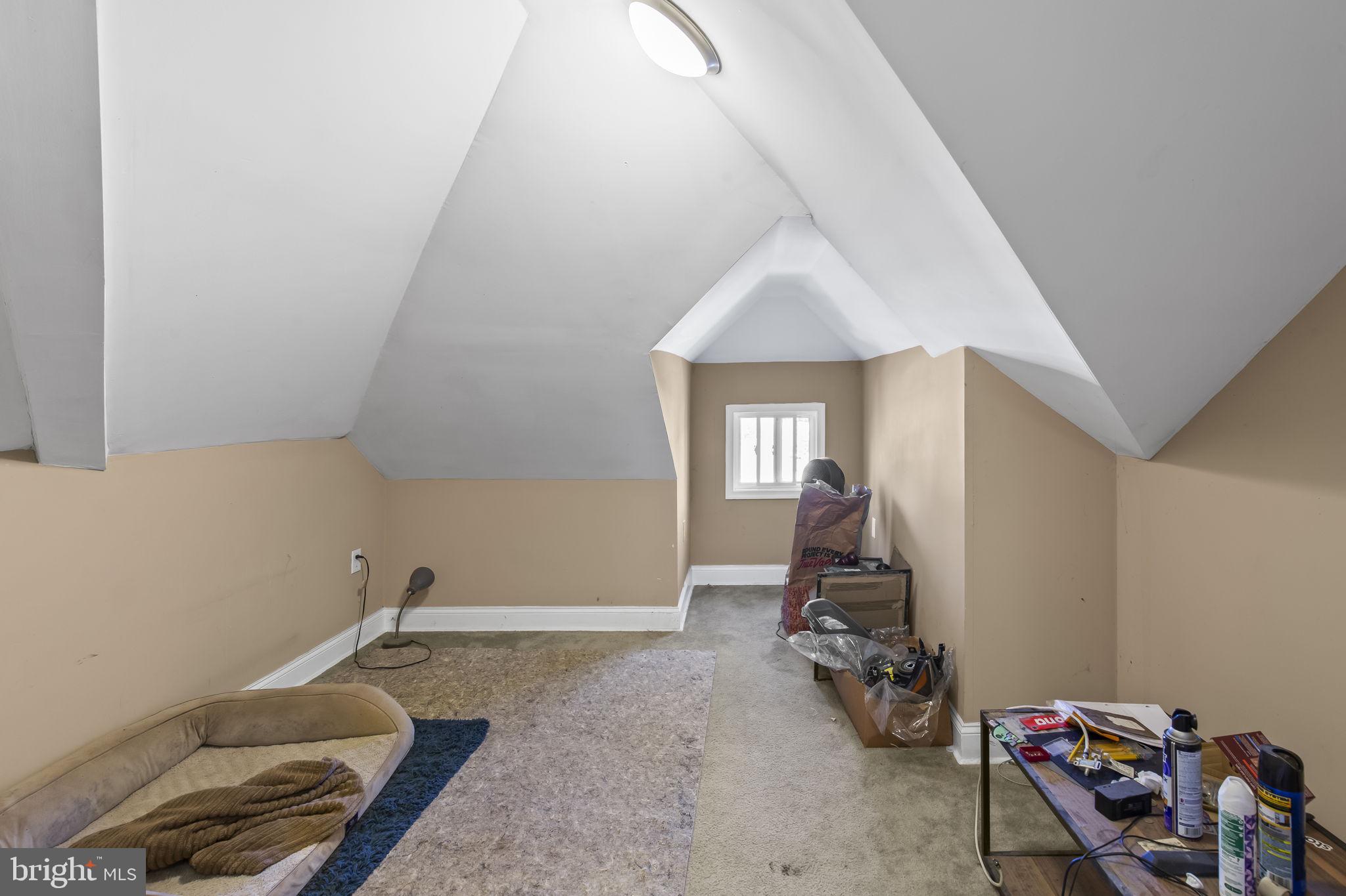 2600 Queen Anne Road Baltimore, MD 21216 - Photo 17 of 29 a room with gym equipment and a rug