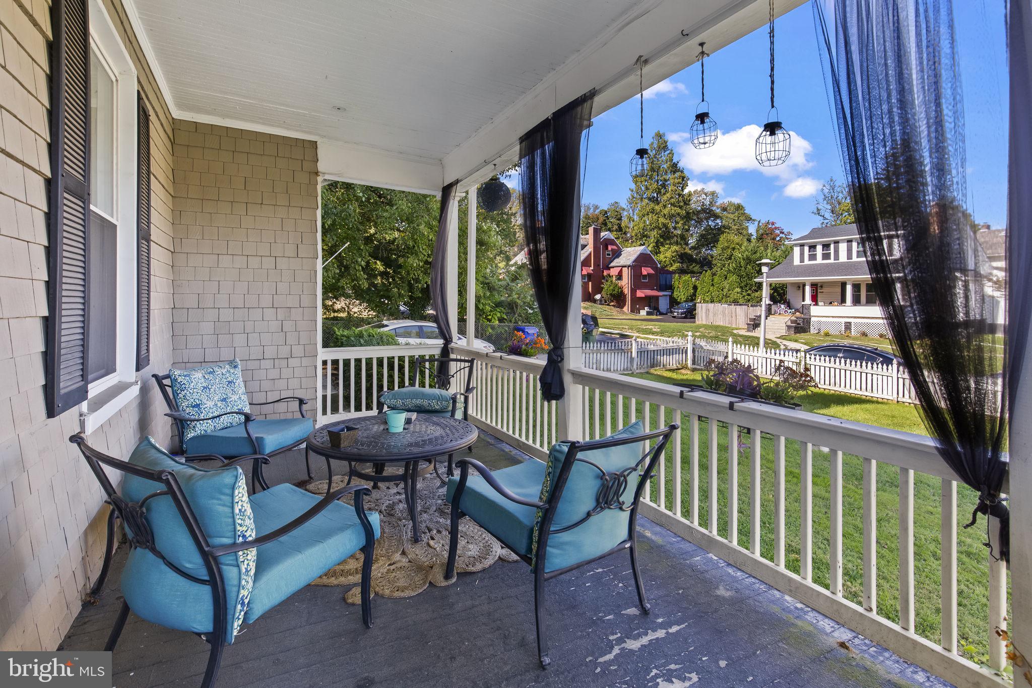2600 Queen Anne Road Baltimore, MD 21216 - Photo 3 of 29 a view of a chairs and table in the balcony