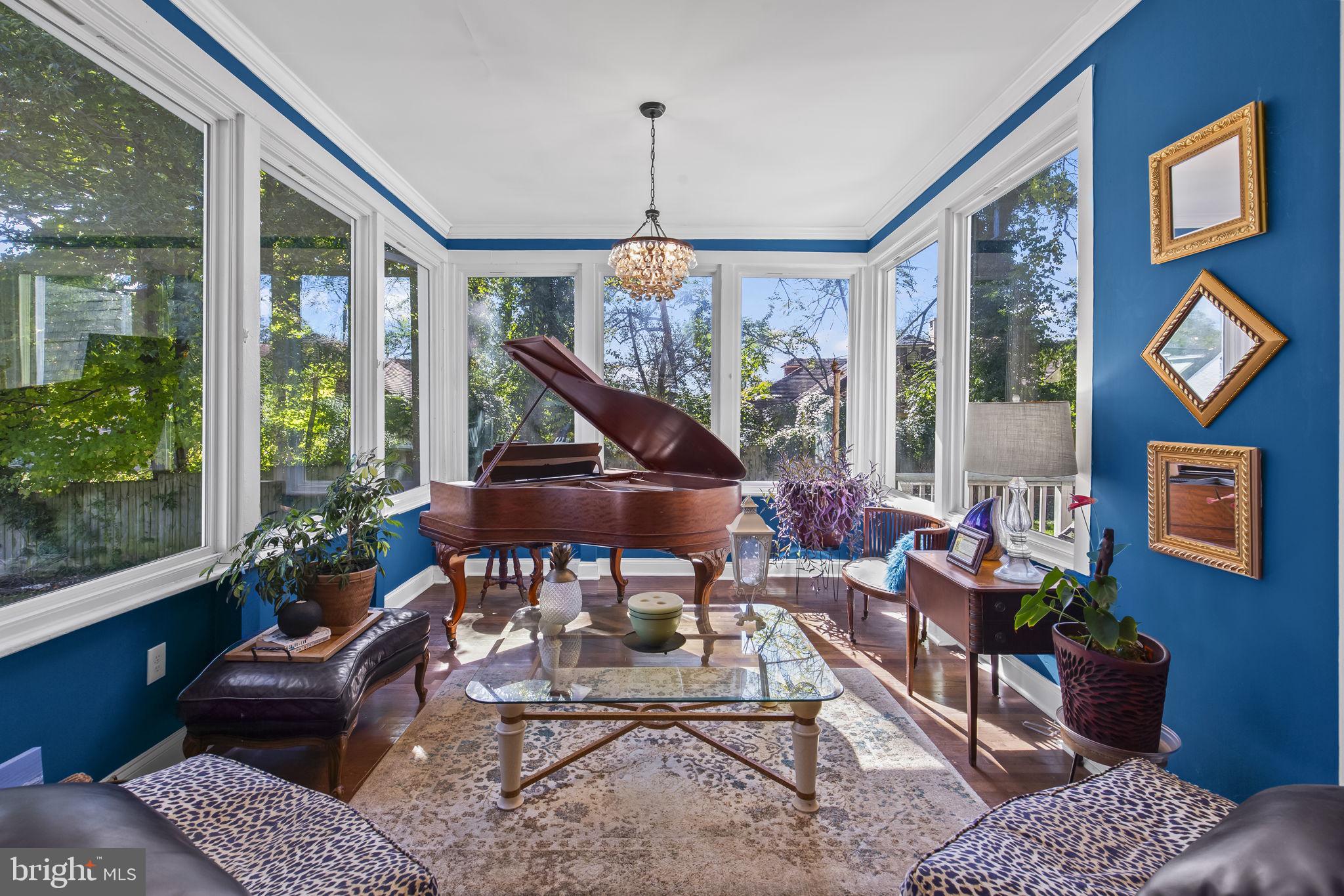 2600 Queen Anne Road Baltimore, MD 21216 - Photo 9 of 29 a living room with furniture a window and a potted plant