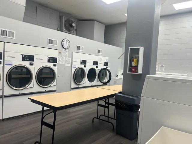 a view of a kitchen with appliances and cabinets