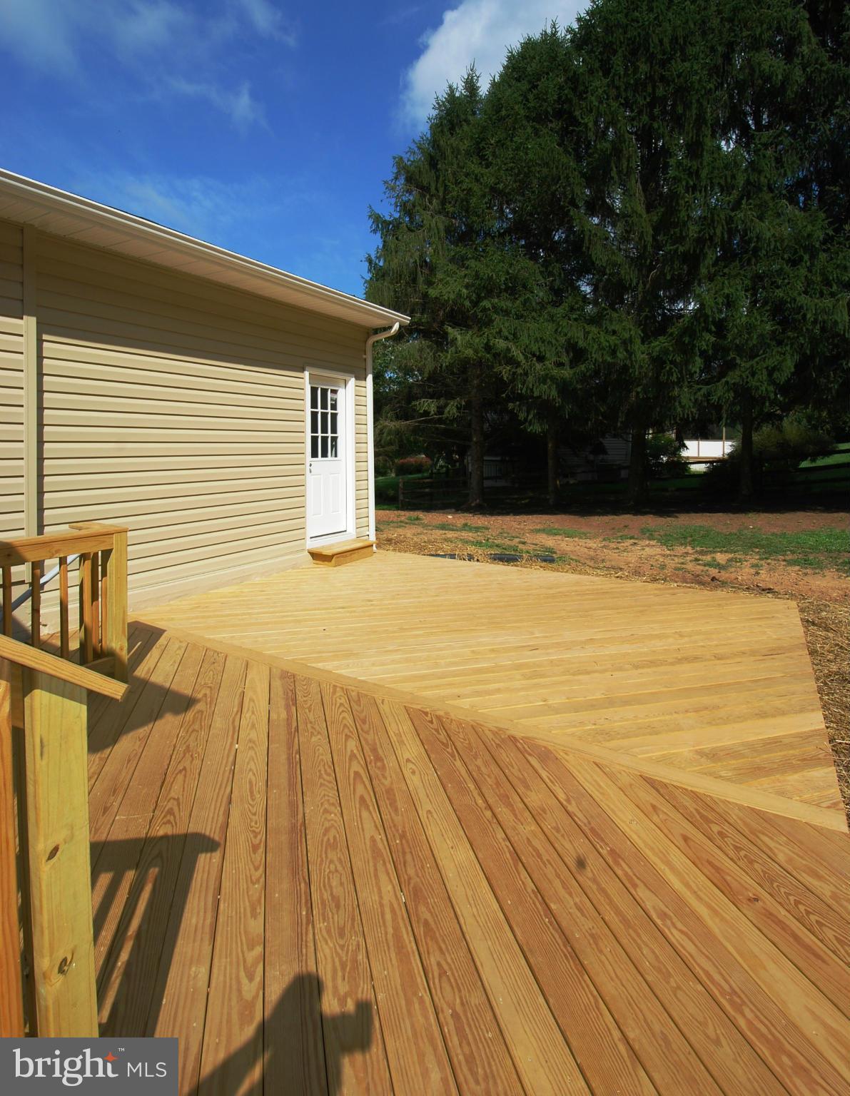 23501 Slidell Road Boyds, MD 20841 - Photo 22 of 27 a view of a swimming pool with an outdoor space and seating area