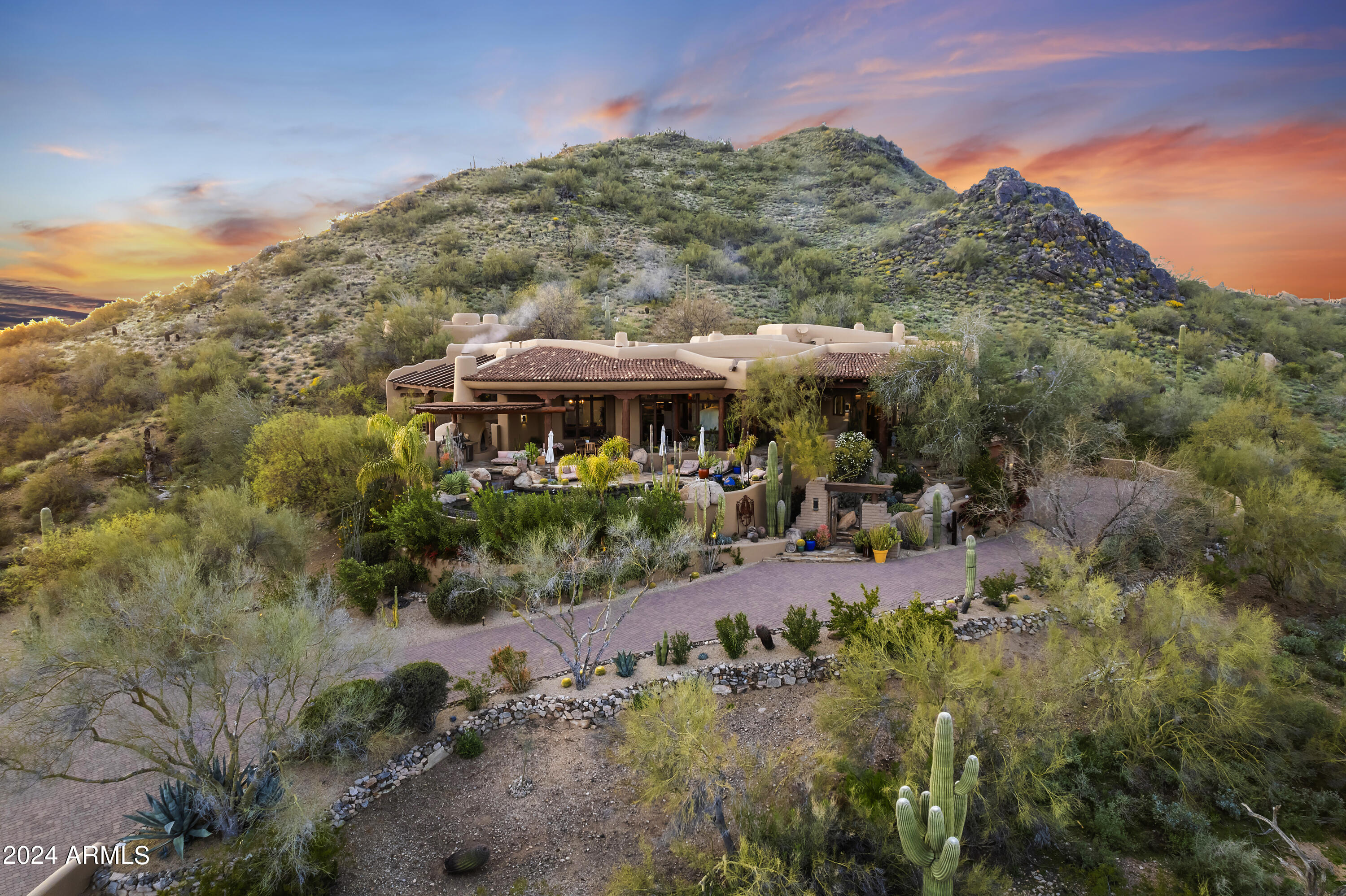 view of an outdoor space with yard and mountain view in back