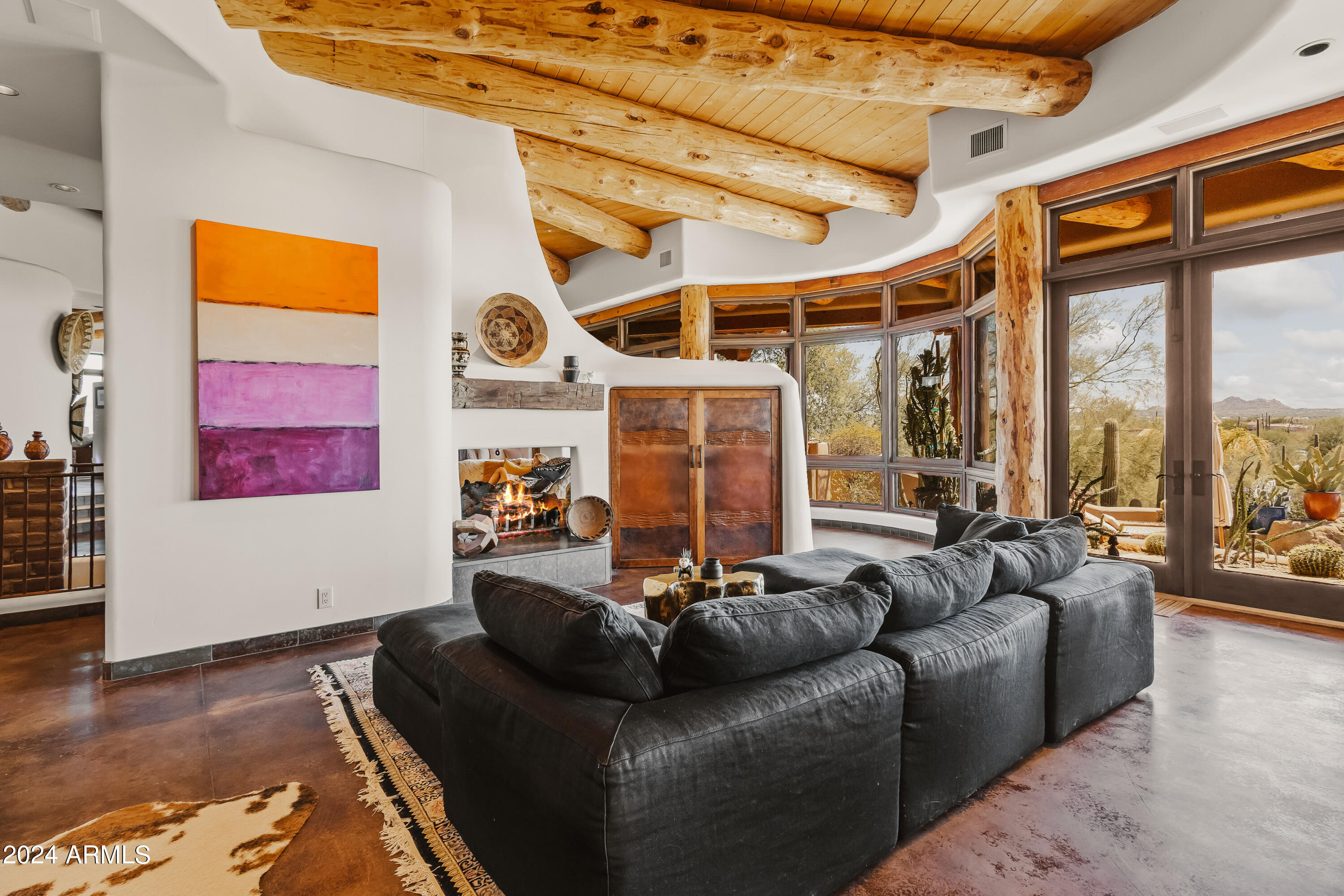 8300 East Dixileta Drive, Unit 263 Scottsdale, AZ 85266 - Photo 16 of 53 a living room with furniture and a large window