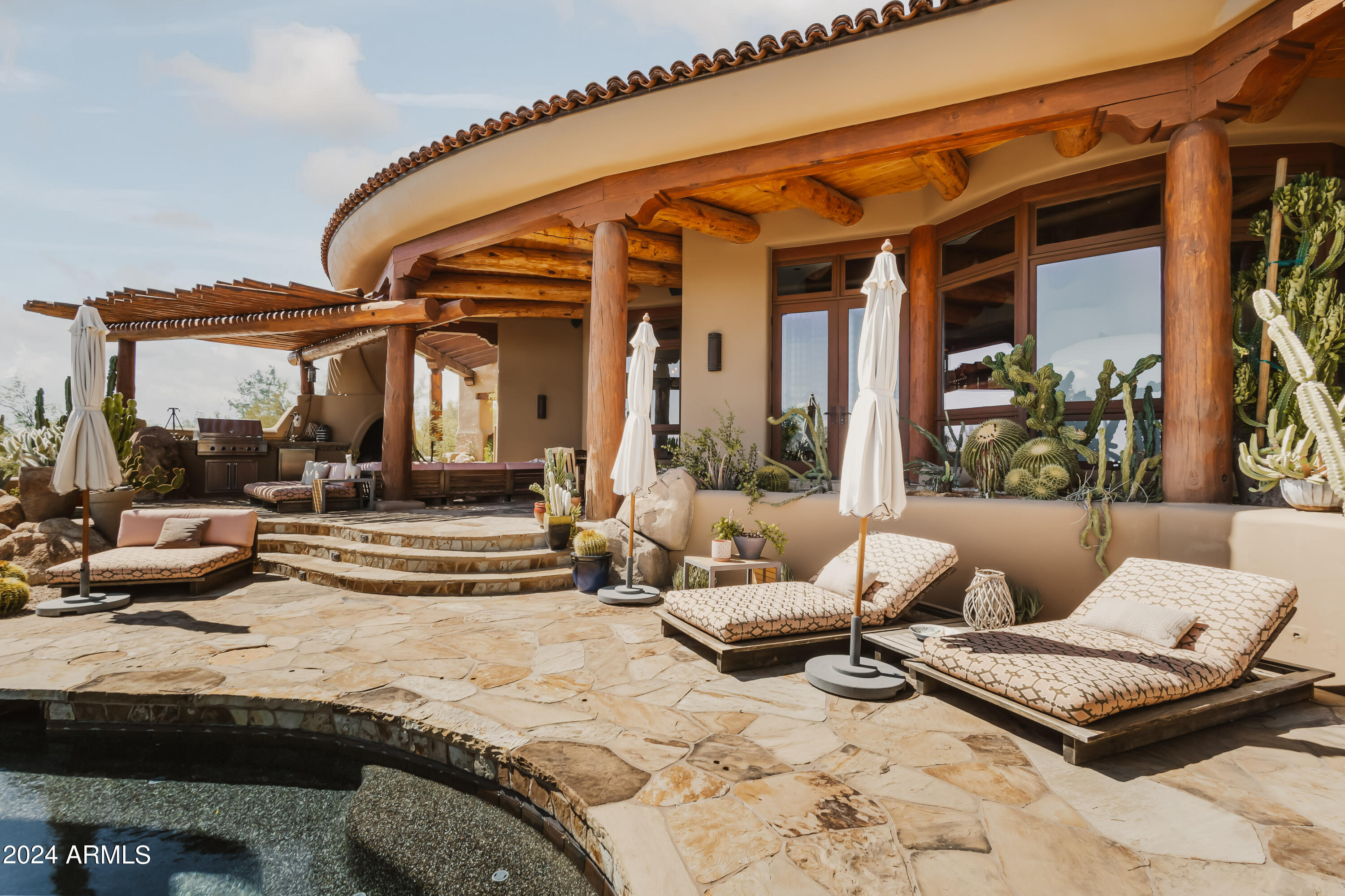 8300 East Dixileta Drive, Unit 263 Scottsdale, AZ 85266 - Photo 39 of 53 a living room with furniture and a large window