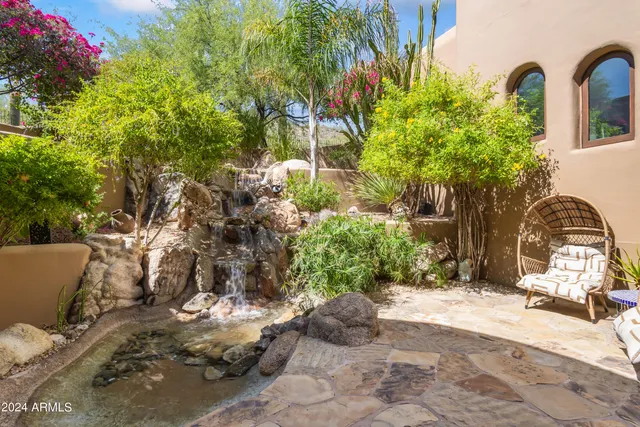 a view of balcony with furniture