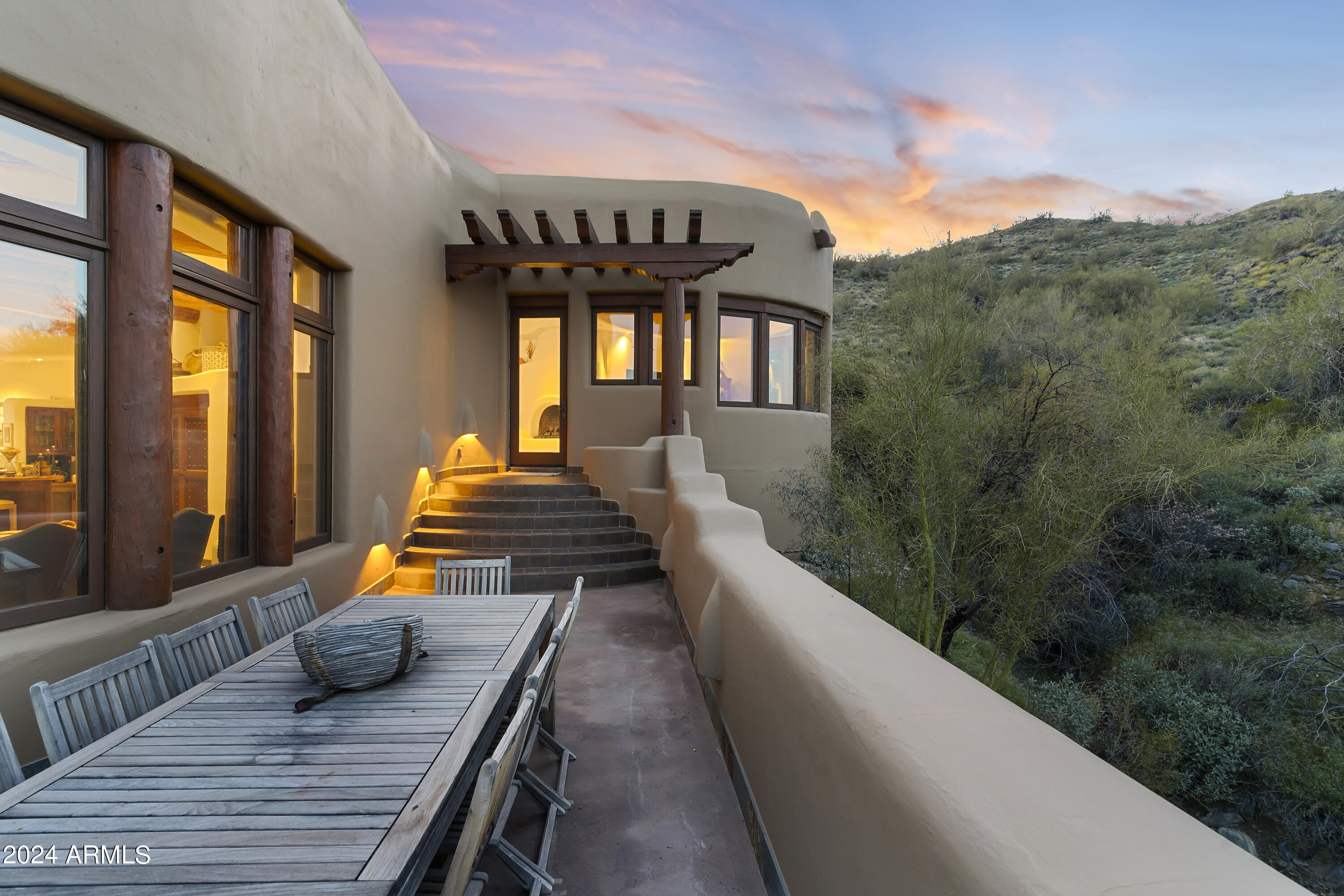 8300 East Dixileta Drive, Unit 263 Scottsdale, AZ 85266 - Photo 48 of 53 a view of a roof deck with couches and sky view