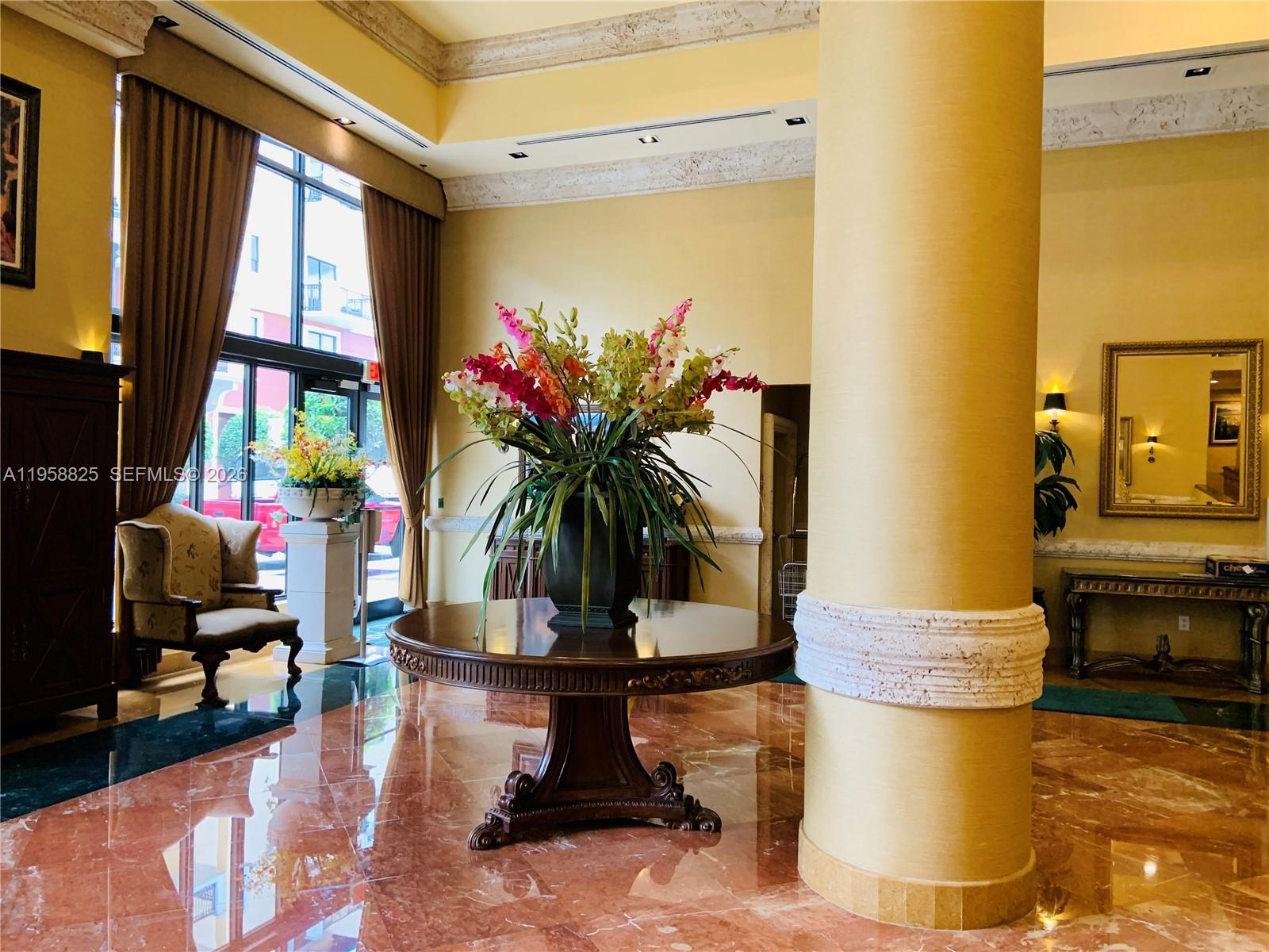 8395 Southwest 73rd Avenue, Unit 704 Miami, FL 33143 - Photo 3 of 47 a dining room with fireplace furniture and a potted plant