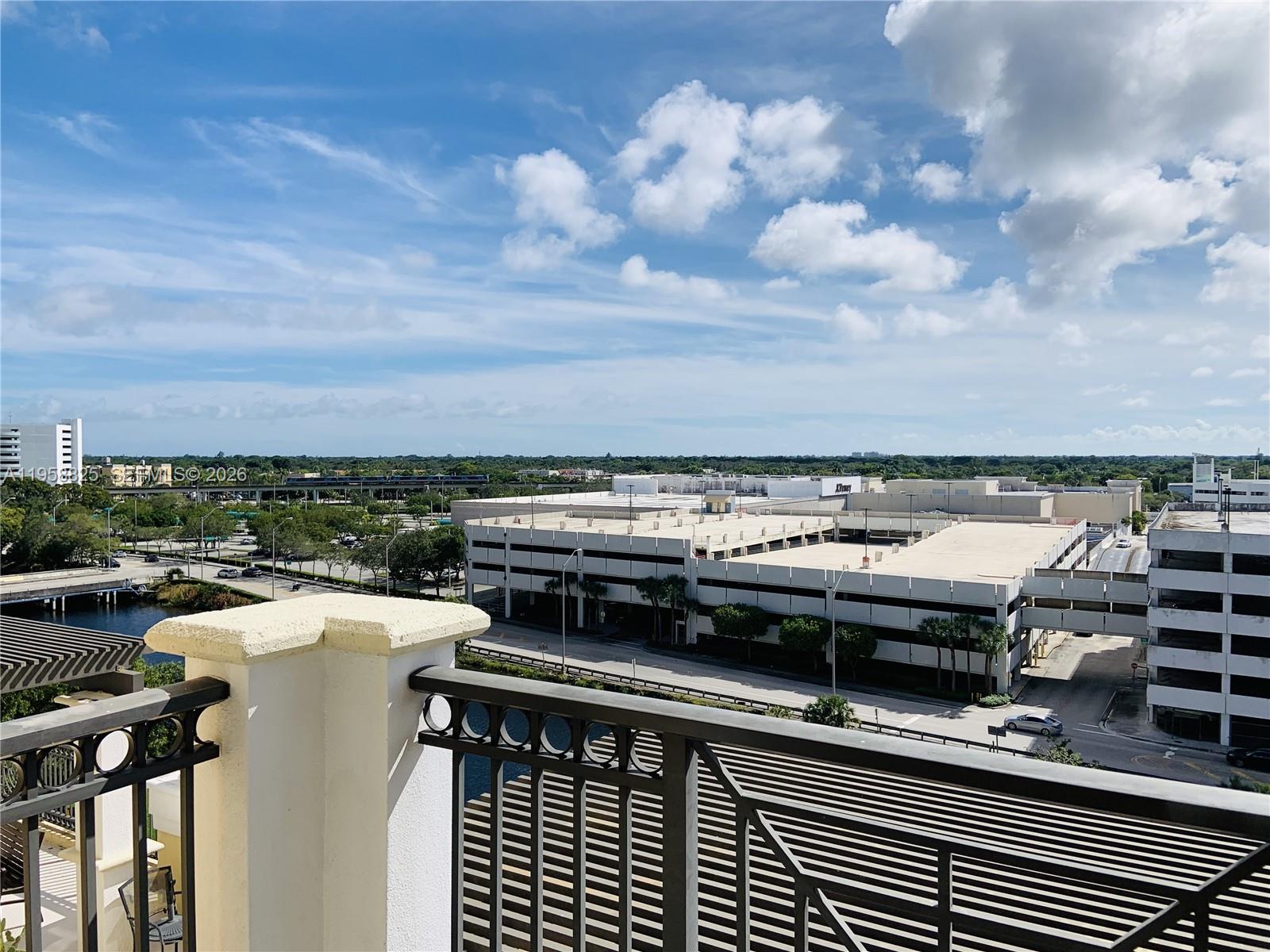 8395 Southwest 73rd Avenue, Unit 704 Miami, FL 33143 - Photo 31 of 47 a view of a terrace with a barbeque