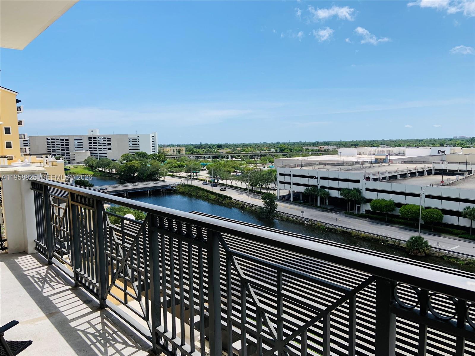 8395 Southwest 73rd Avenue, Unit 704 Miami, FL 33143 - Photo 36 of 47 a view of city from a balcony