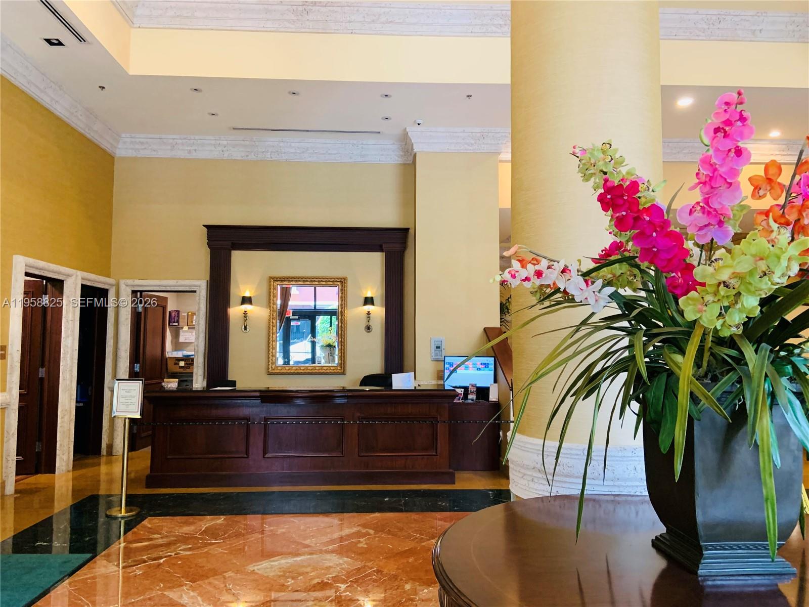 8395 Southwest 73rd Avenue, Unit 704 Miami, FL 33143 - Photo 4 of 47 a living room with furniture and flower pot