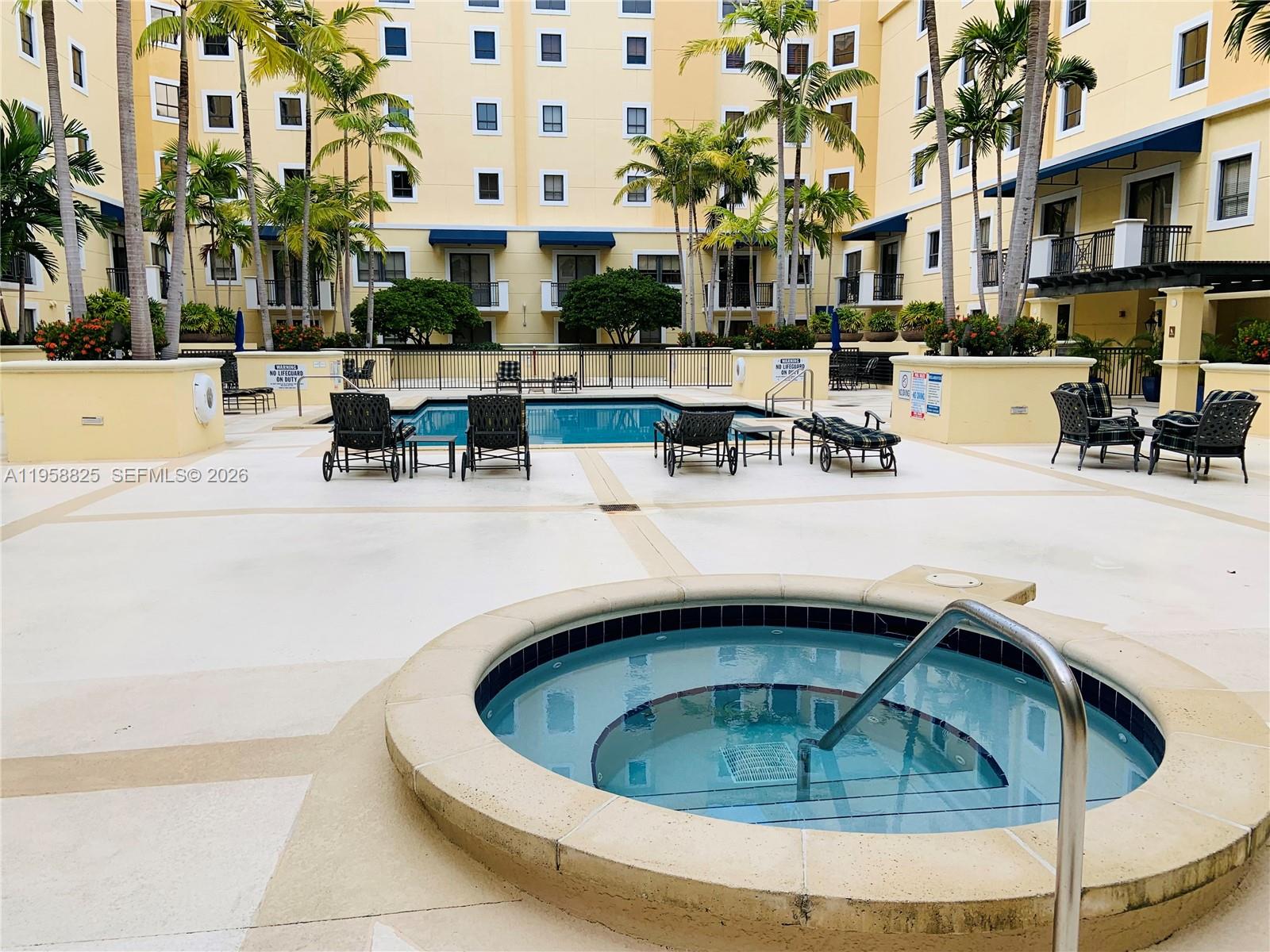 8395 Southwest 73rd Avenue, Unit 704 Miami, FL 33143 - Photo 41 of 47 a view of building with outdoor space